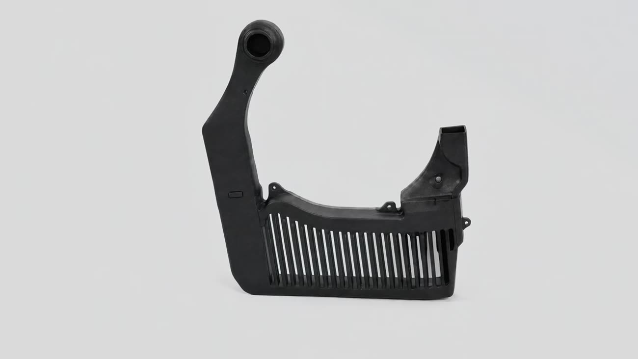 Black injection-moulded plastic bracket with vent slots, product shot on white
